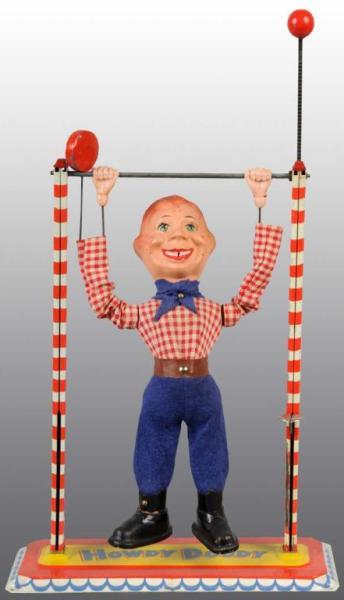 Appraisal: Composition Cloth Howdy Doody Swing Toy Description German Marked Howdy