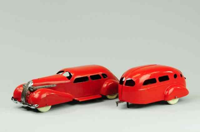 Appraisal: a WYANDOTTE STREAMLINED SEDAN WITH TRAILER Pressed steel painted in