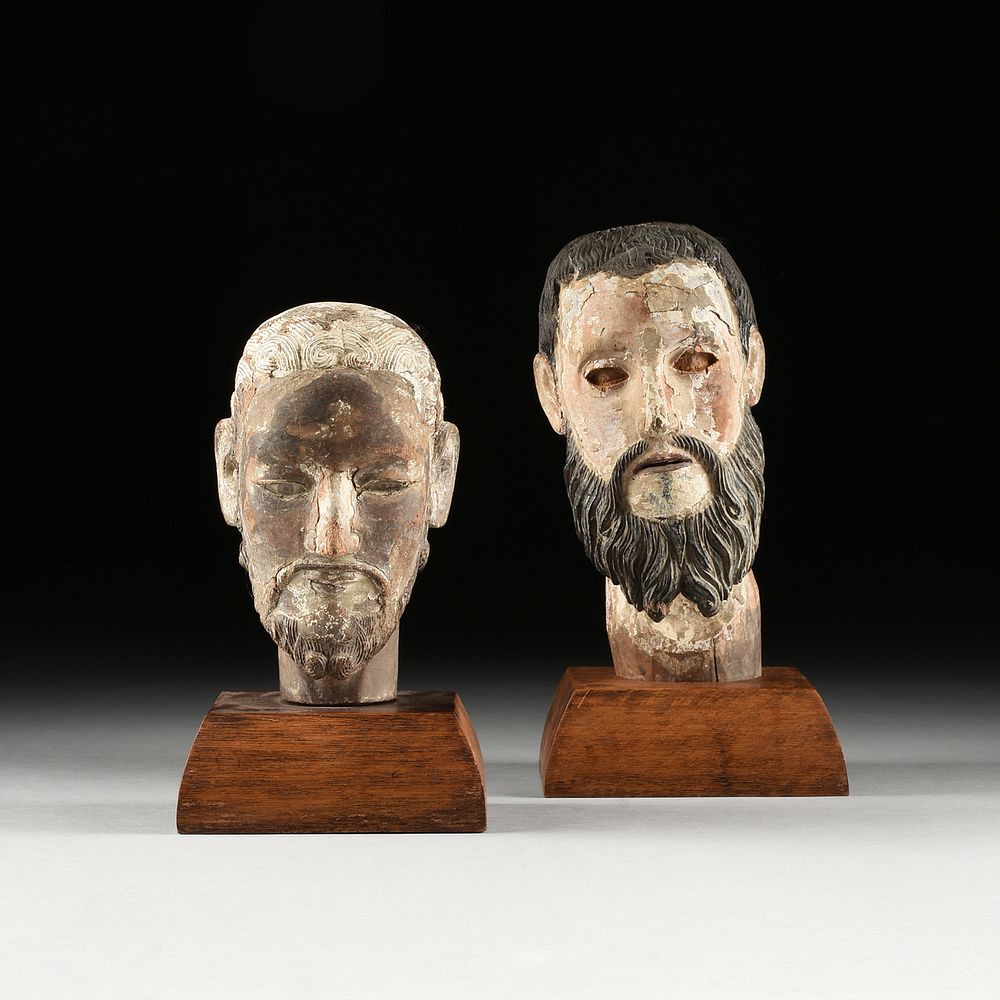 Appraisal: A GROUP OF TWO SANTOS' HEADS LATE TH EARLY TH