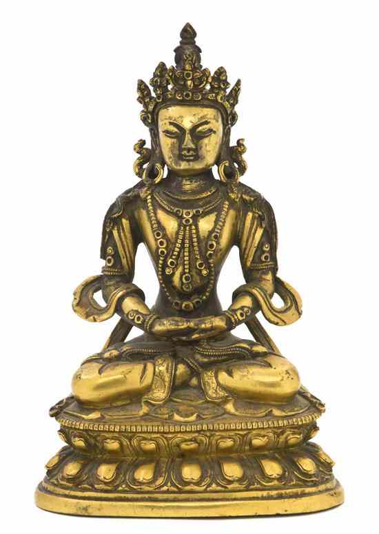 Appraisal: A Gilt Bronze Figure of a Bodhisattva shown in a