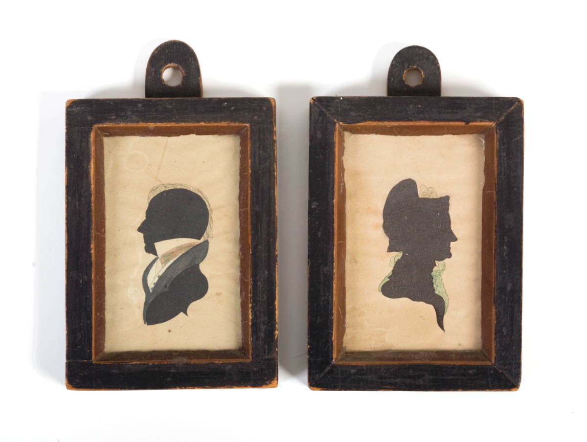 Appraisal: PAIR OF AMERICAN SILHOUETTES IN UNUSUAL CARVED AND BLACK PAINTED