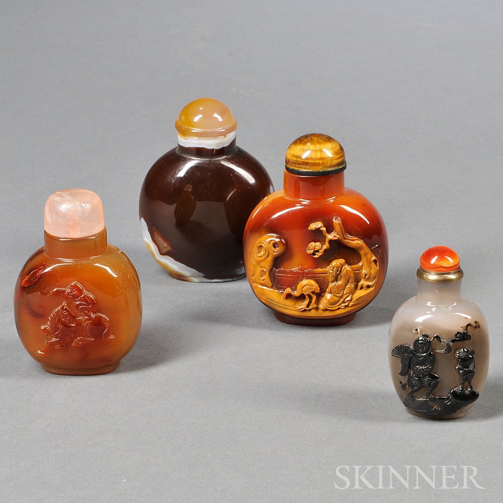 Appraisal: Four Agate Snuff Bottles China a round plain dark brown