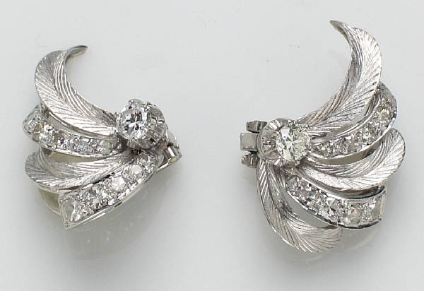 Appraisal: A pair of diamond clip-earrings estimated total diamond weight carats