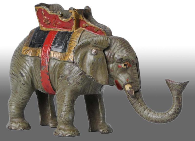 Appraisal: Cast Iron Elephant Swings Trunk Mechanical Bank Description Manufactured by