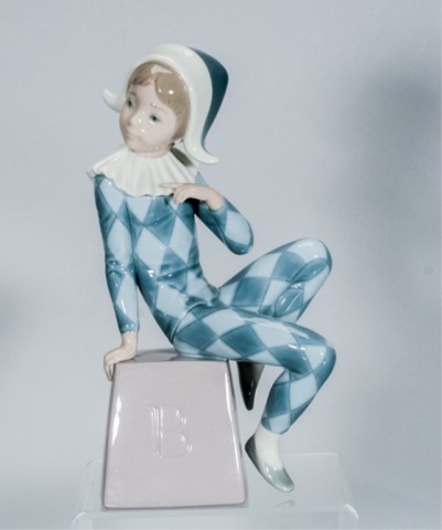 Appraisal: Lladro Jester Figure Lladro figure of a Young Jester seated