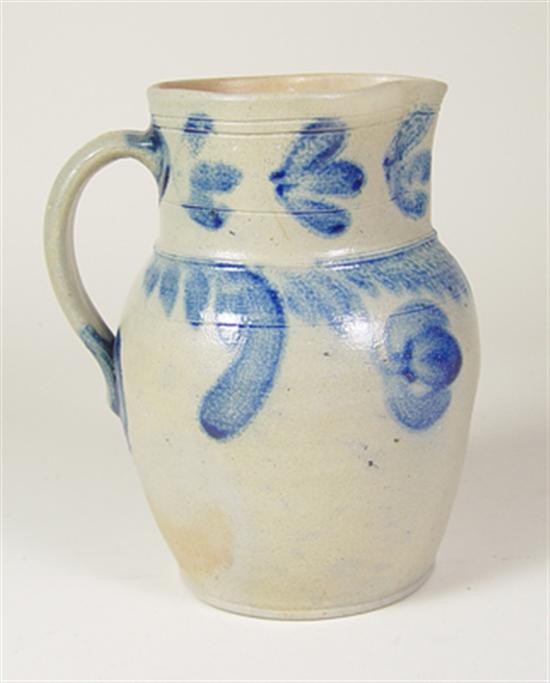 Appraisal: American Stoneware Pitcher Freehand floral decoration restoration at spout rim