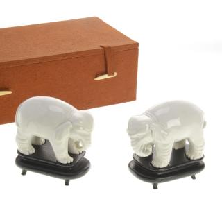 Appraisal: Pair Chinese blanc-de-chine porcelain elephants Possibly Ming with hardwood stands