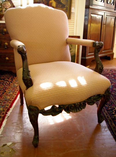 Appraisal: French-Style Carved Mahogany Lolling Chair early th century the padded