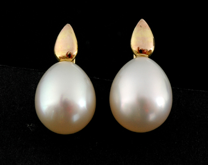 Appraisal: A pair of South Sea pearl drop earrings The pear