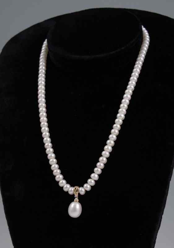 Appraisal: STRAND OF MM CULTURED PEARLS WITH DROP '' Strand of