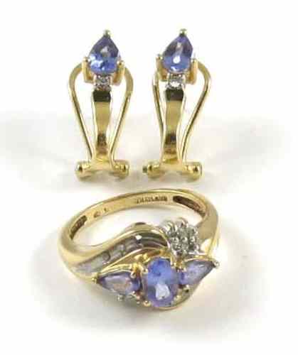 Appraisal: THREE ARTICLES OF TANZANITE JEWELRY including a ring and pair