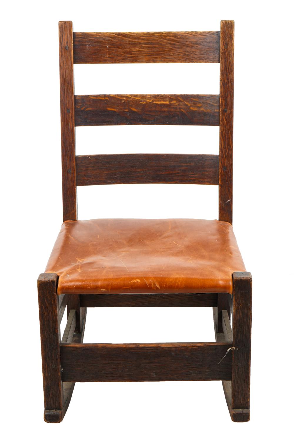 Appraisal: SMALL ARTS CRAFTS OAK ROCKING CHAIRunsigned with later faux leather