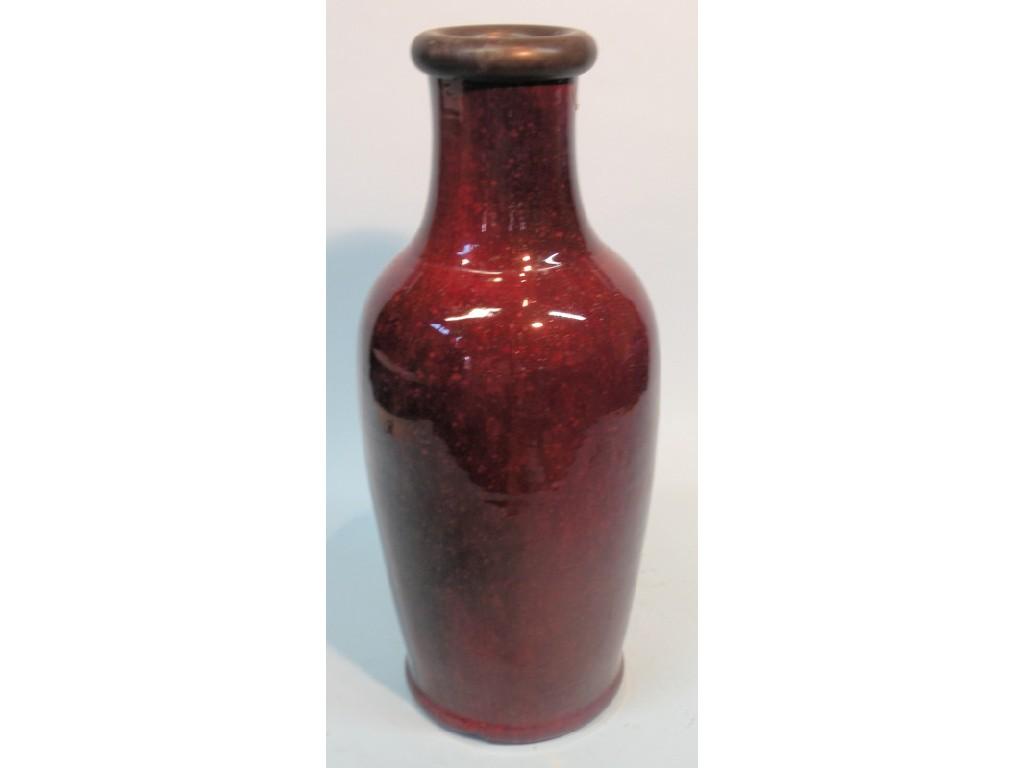 Appraisal: A Chinese flambe glazed red vase reduced in height and