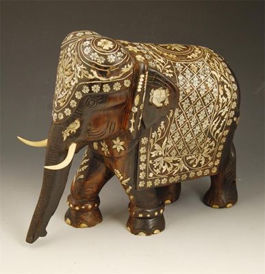 Appraisal: An Indian carved ebonised wood and ivory inlaid model of