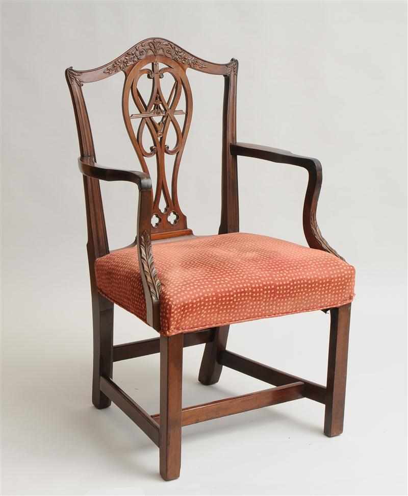 Appraisal: GEORGE III CARVED MAHOGANY ARMCHAIR The serpentine top rail with