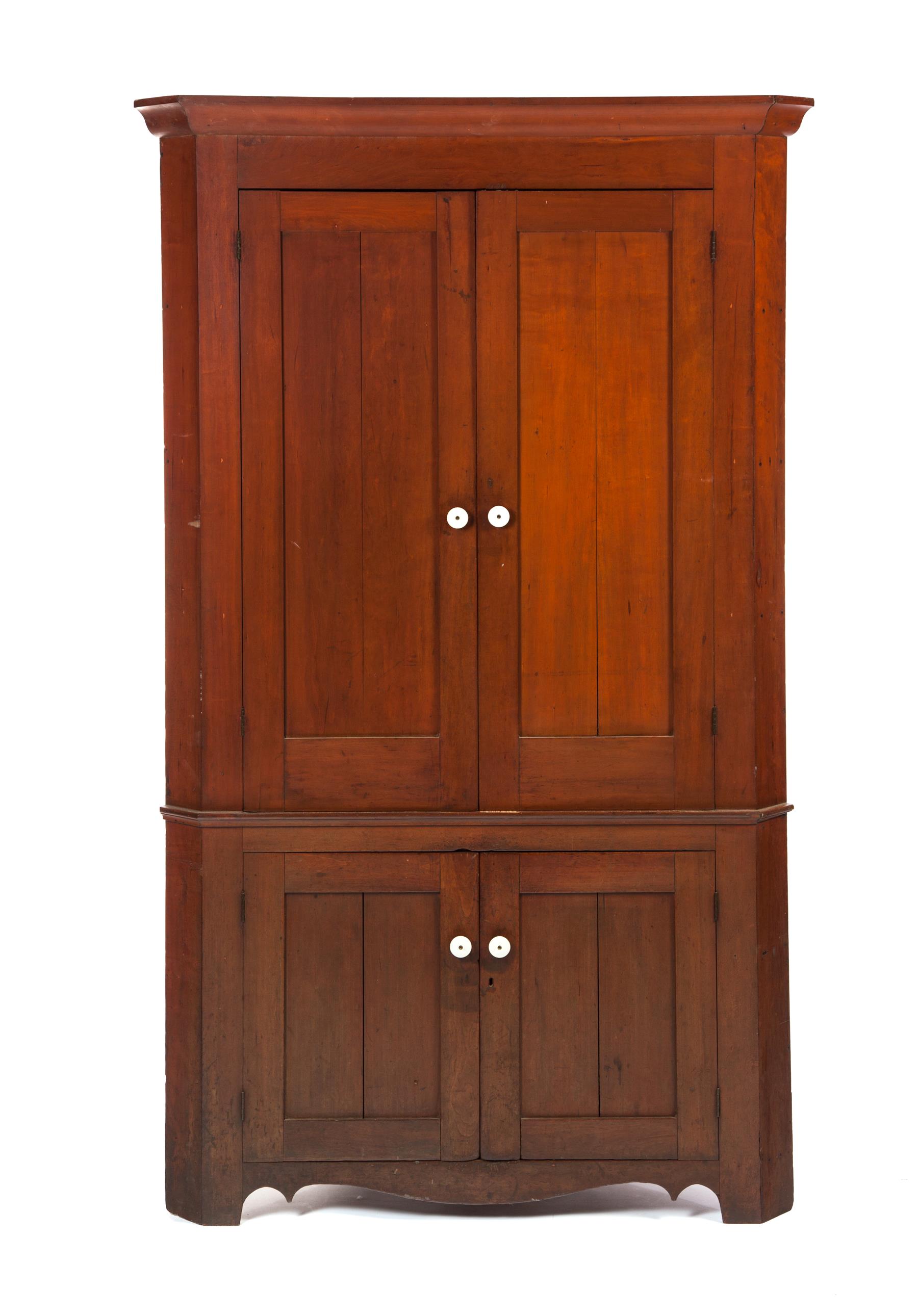 Appraisal: ONE-PIECE COUNTRY CORNER CUPBOARD American rd quarter- th century cherry