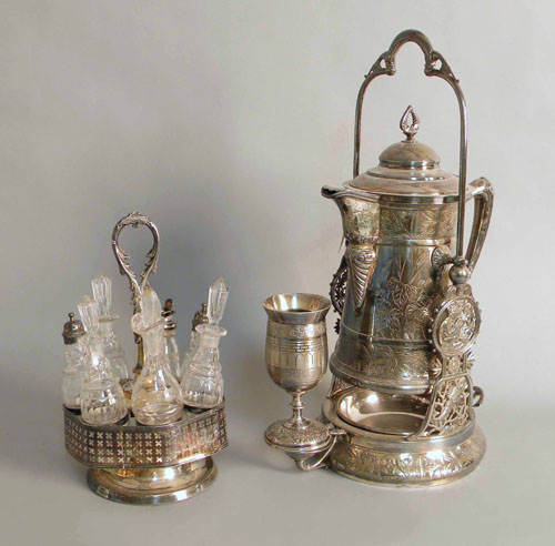 Appraisal: Silver plated cruet set h together with a plated pitcher