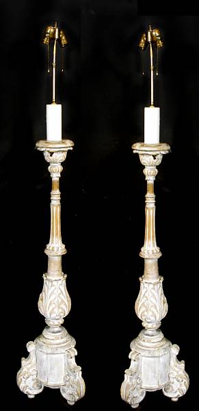 Appraisal: A pair of Italian Baroque style carved walnut floor lamp