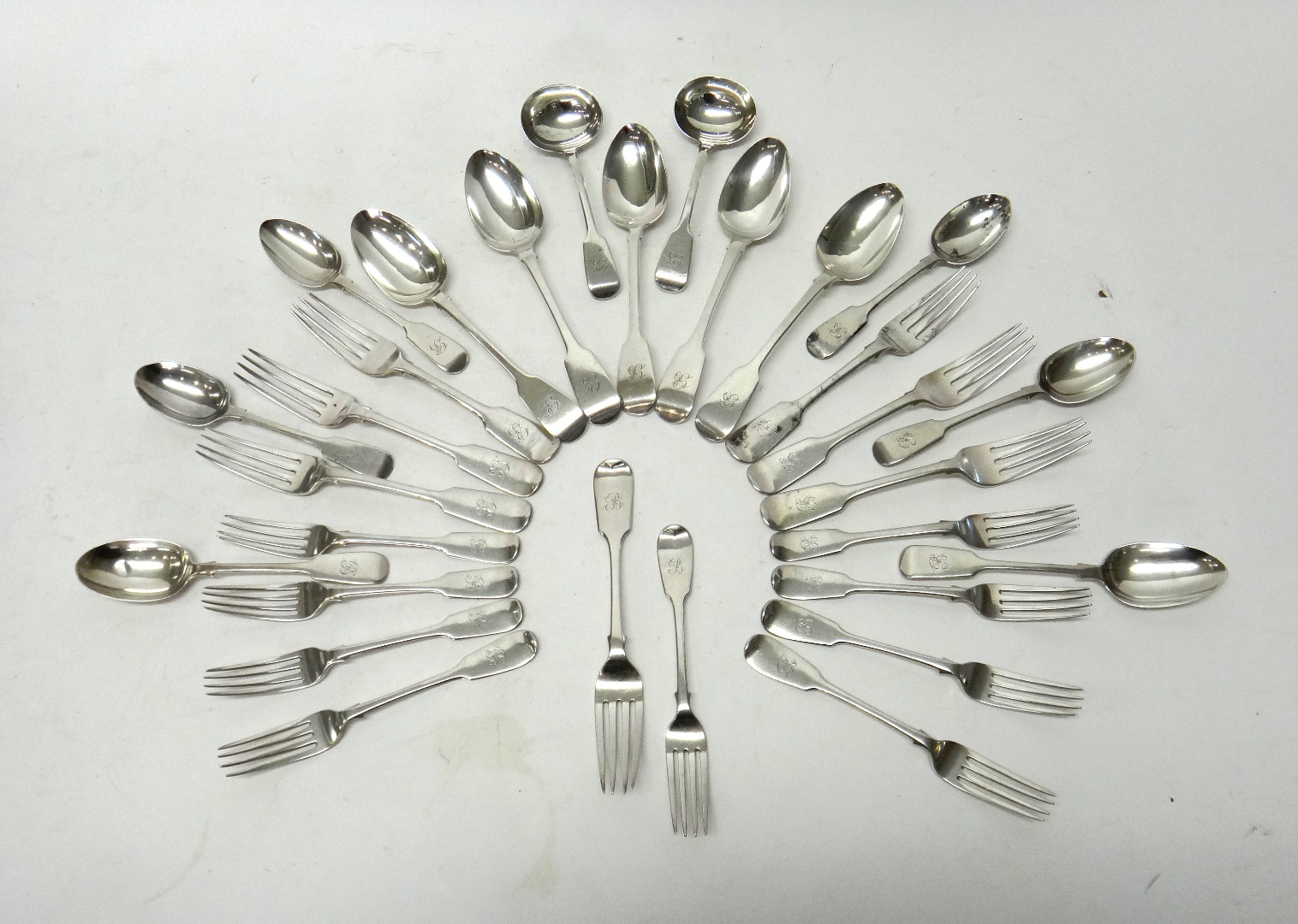 Appraisal: Silver fiddle pattern table flatware comprising five tablespoons seven table