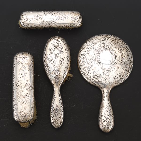 Appraisal: GORHAM ROCOCO REVIVAL STERLING SILVER FOUR-PIECE VANITY SET With hand