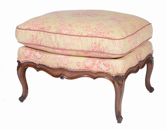 Appraisal: A FRENCH WALNUT STOOL of rectangular form with carved decoration