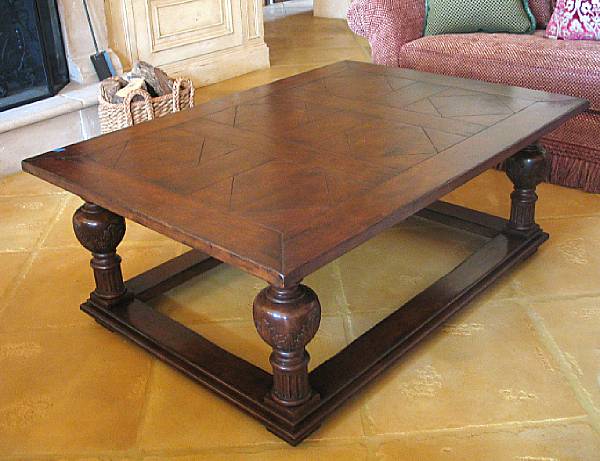 Appraisal: An Italian Baroque style walnut low table height in width