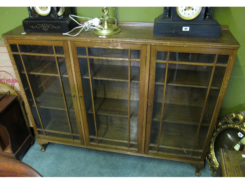 Appraisal: Oak three door bookcase