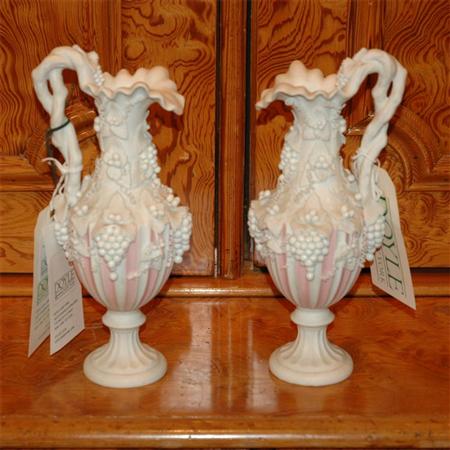 Appraisal: Pair of Bisque Porcelain Ewers Estimate -