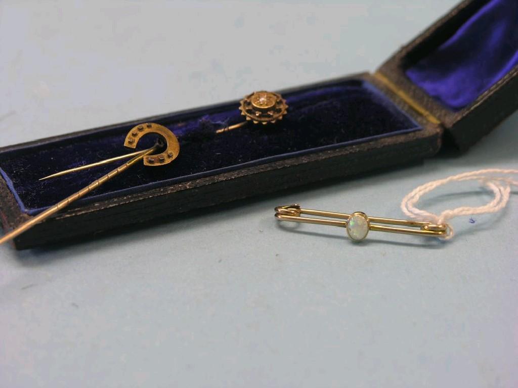 Appraisal: Two Victorian ct gold tie-pins and a yellow metal and