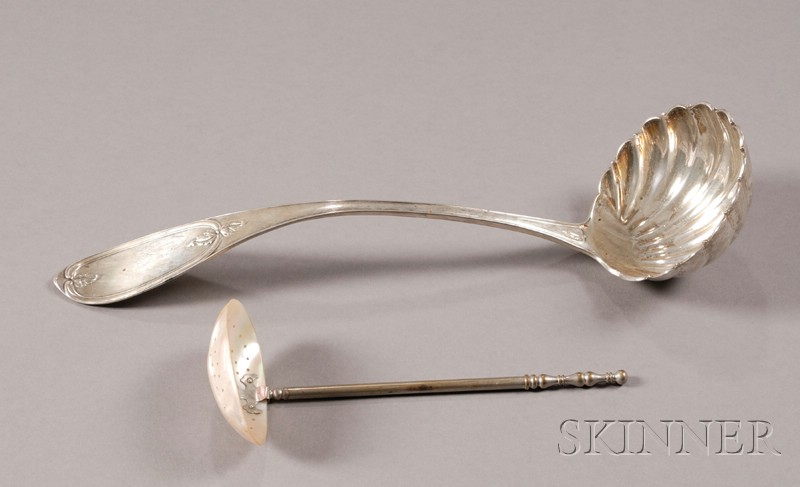 Appraisal: Two Ladles a large sterling silver ladle with shell-form bowl