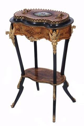 Appraisal: A FRENCH KIDNEY SHAPED JARDINIERE STAND with marquetry and ebonised