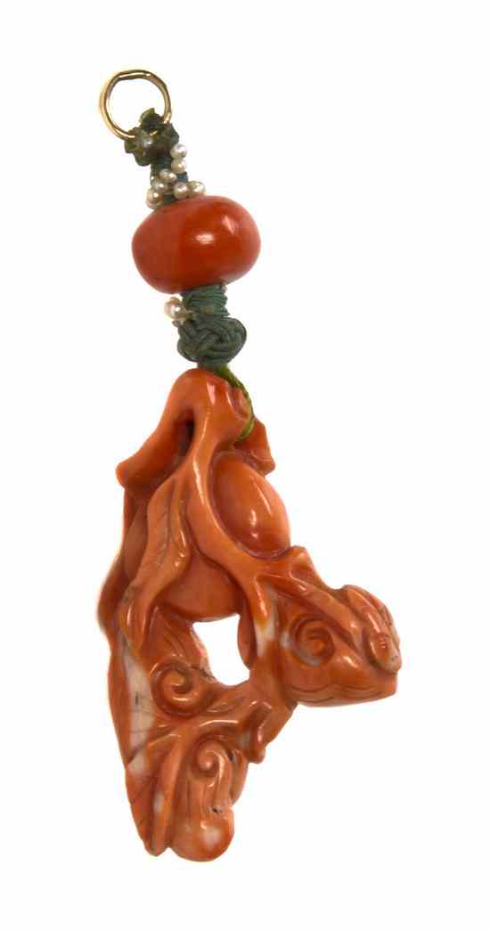 Appraisal: A Chinese Carved Coral Toggle in the form of a