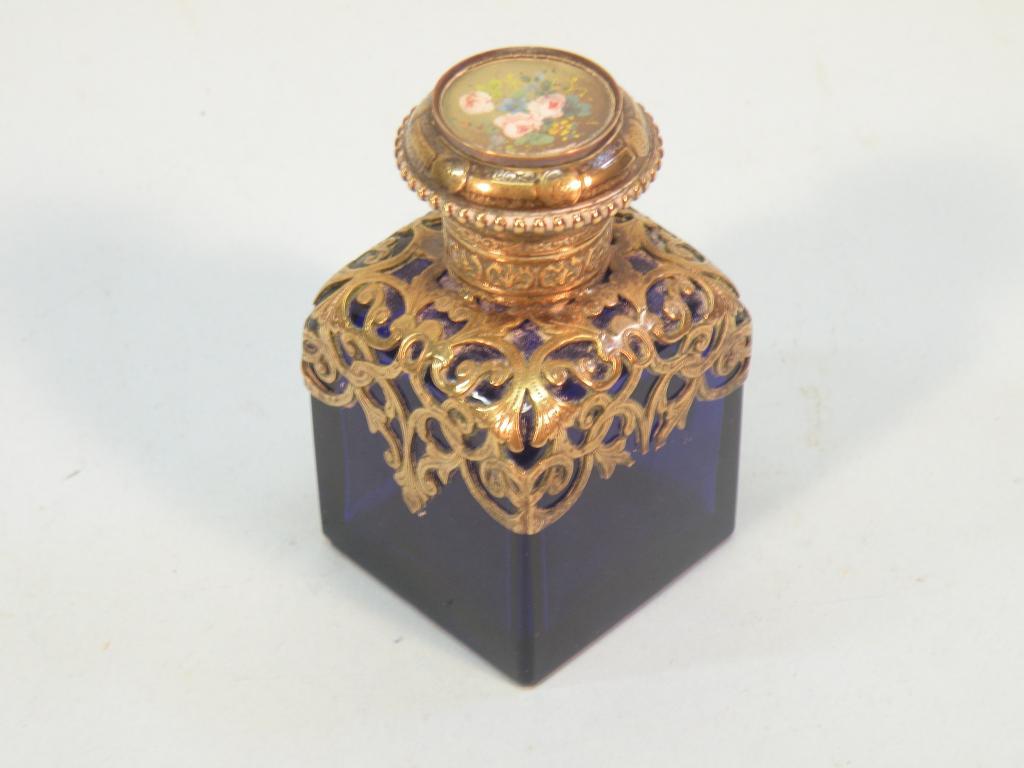 Appraisal: A continental blue glass scent bottle with a gilt metal