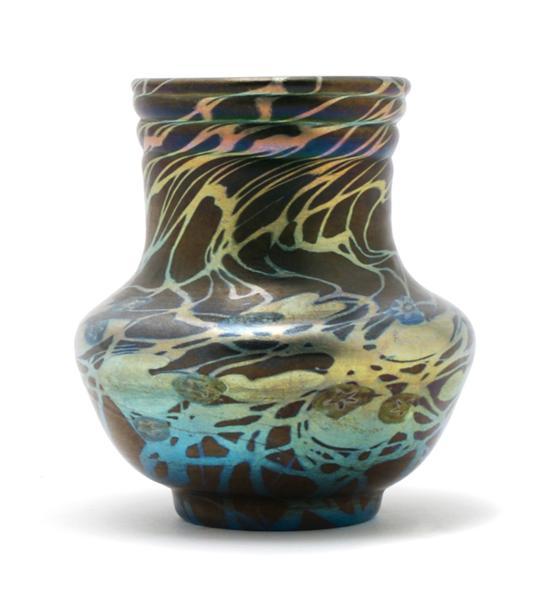 Appraisal: A Tiffany Favrile Glass Damascene Vase of low bottle form