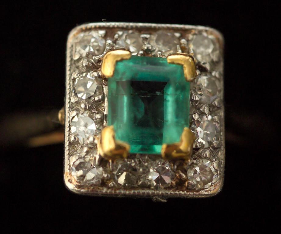 Appraisal: ART DECO EMERALD AND DIAMOND CLUSTER RING the plaque setting