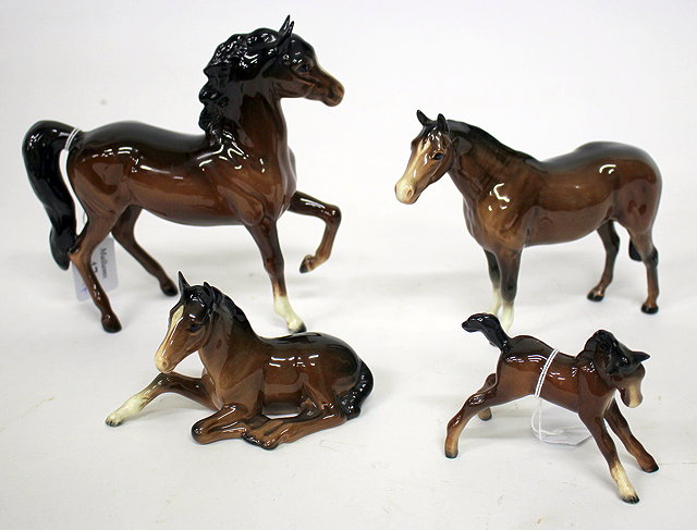 Appraisal: A BESWICK PORCELAIN BROWN COLOURED HORSE cm high together with