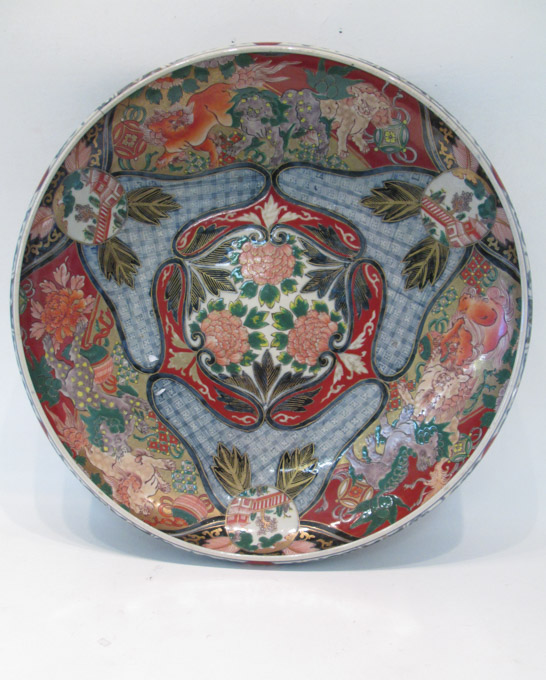 Appraisal: JAPANESE PORCELAIN IMARI BOWL with traditional hand enameled circular reserve