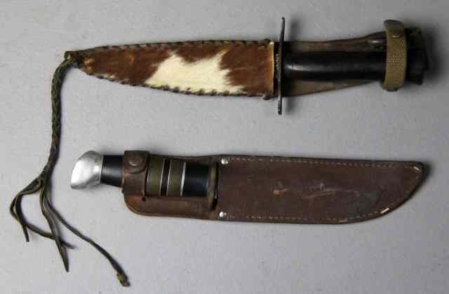 Appraisal: Pcs Hunting KnivesTo include two hunting knives with leather and