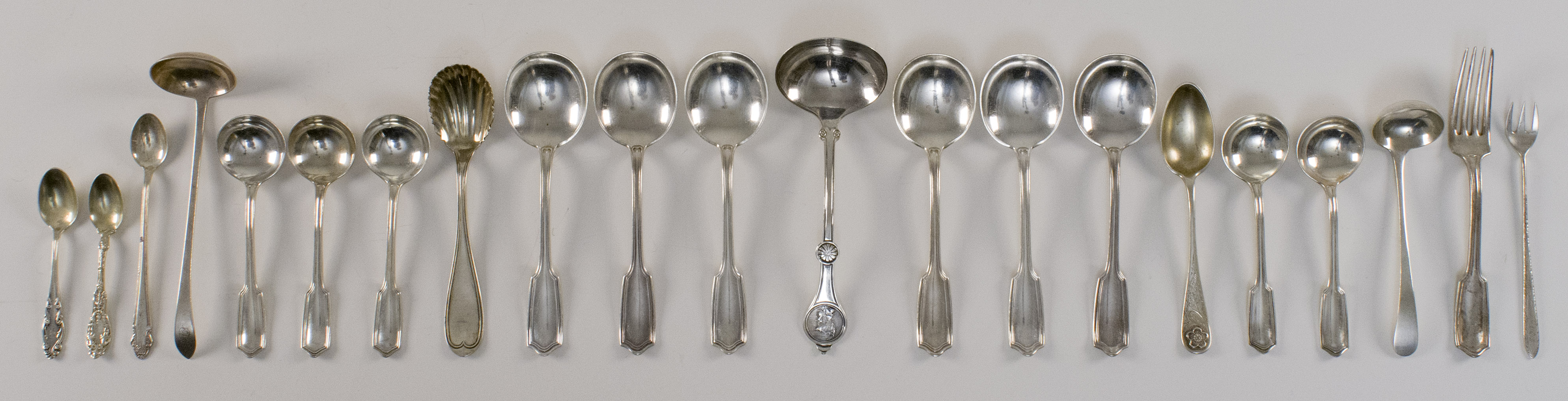 Appraisal: TWENTY-ONE PIECES OF ASSORTED AMERICAN SILVER AND SILVER PLATED FLATWARE