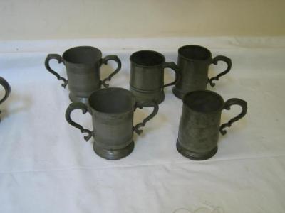 Appraisal: A PAIR OF PEWTER LOVING CUPS with engine turned borders