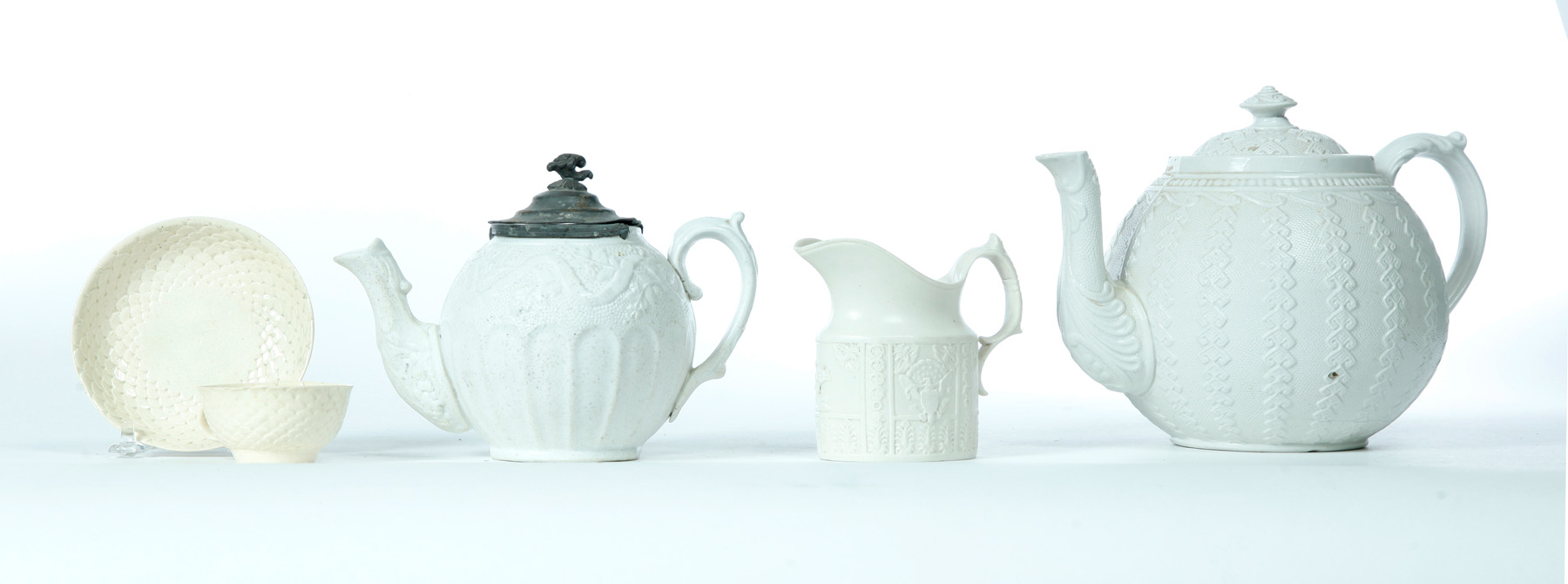 Appraisal: FOUR TEA SERVICE ITEMS England late th-early th century Two