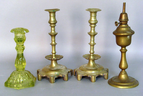 Appraisal: Pair of brass candlesticks h together with a whale oil