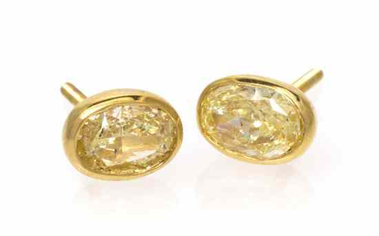 Appraisal: A Pair of Karat Yellow Gold and Yellow Diamond Stud