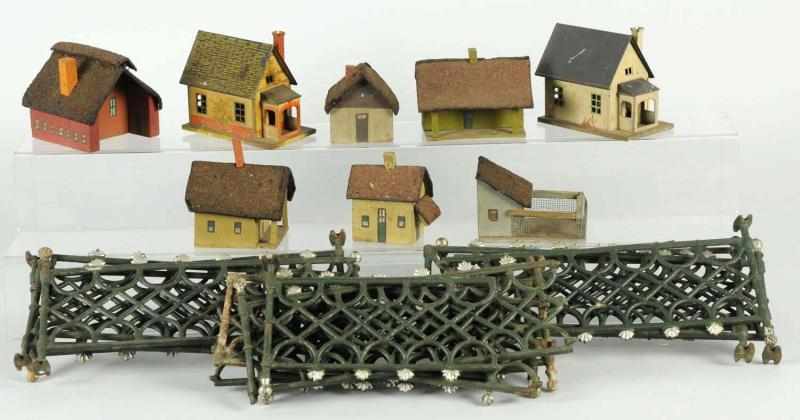 Appraisal: Lot of Iron Fence Train Accessories Includes two Lionel Bungalows