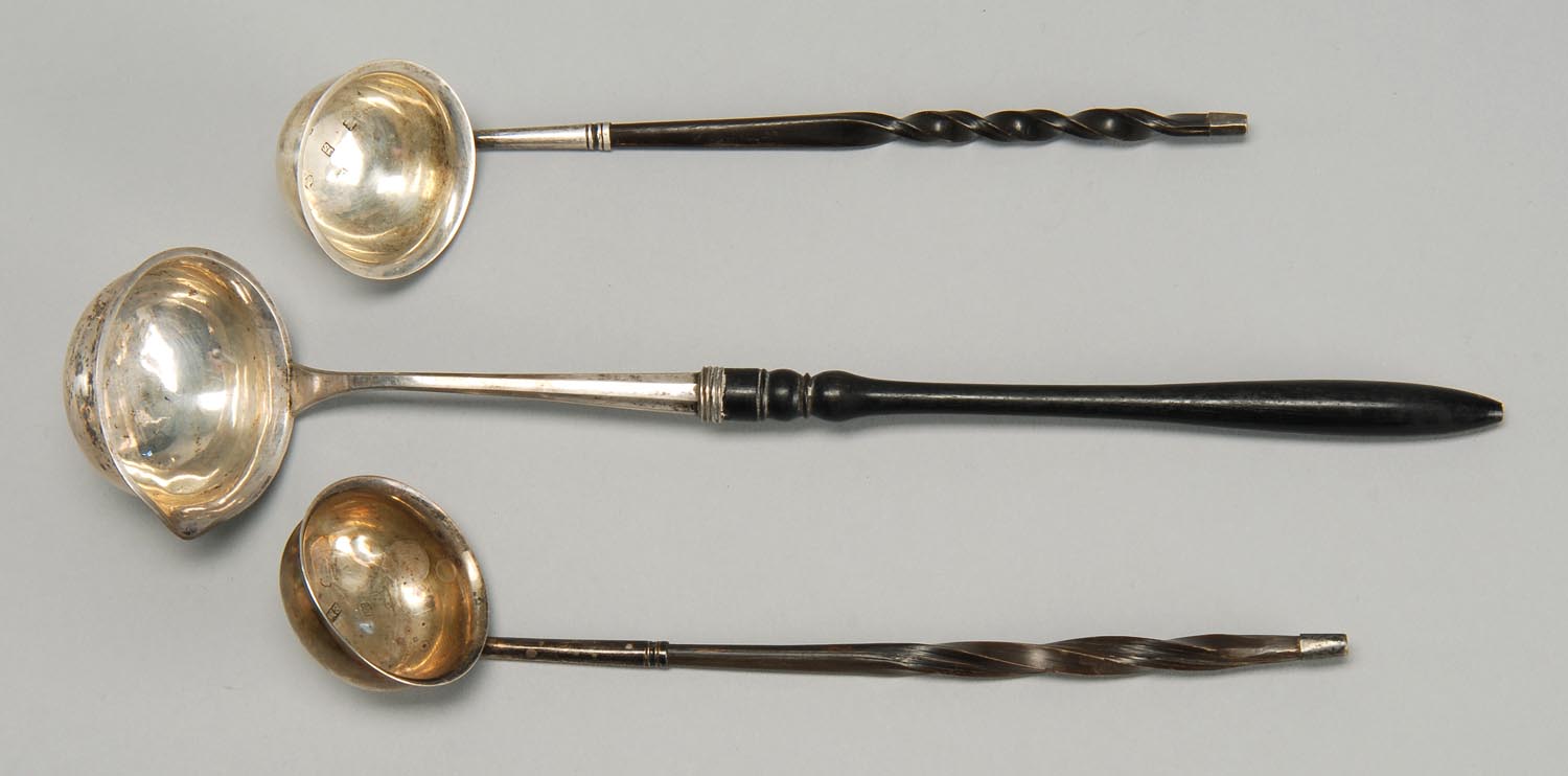 Appraisal: THREE ENGLISH SILVER AND BALEEN LADLES th CenturyOne toddy and