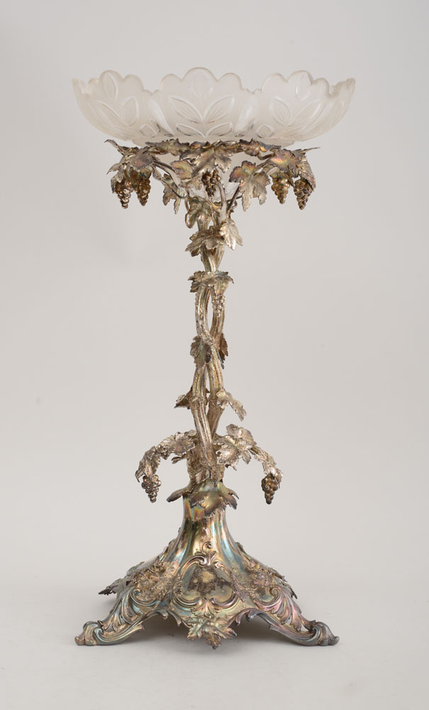 Appraisal: VICTORIAN SILVER-PLATED CENTERPIECE The stem with entwined grapevines rising to