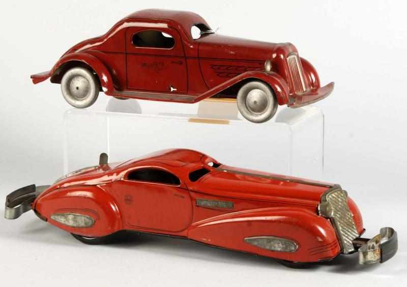 Appraisal: Lot of Tin Litho Automobile Wind-Up Toys Description American Working