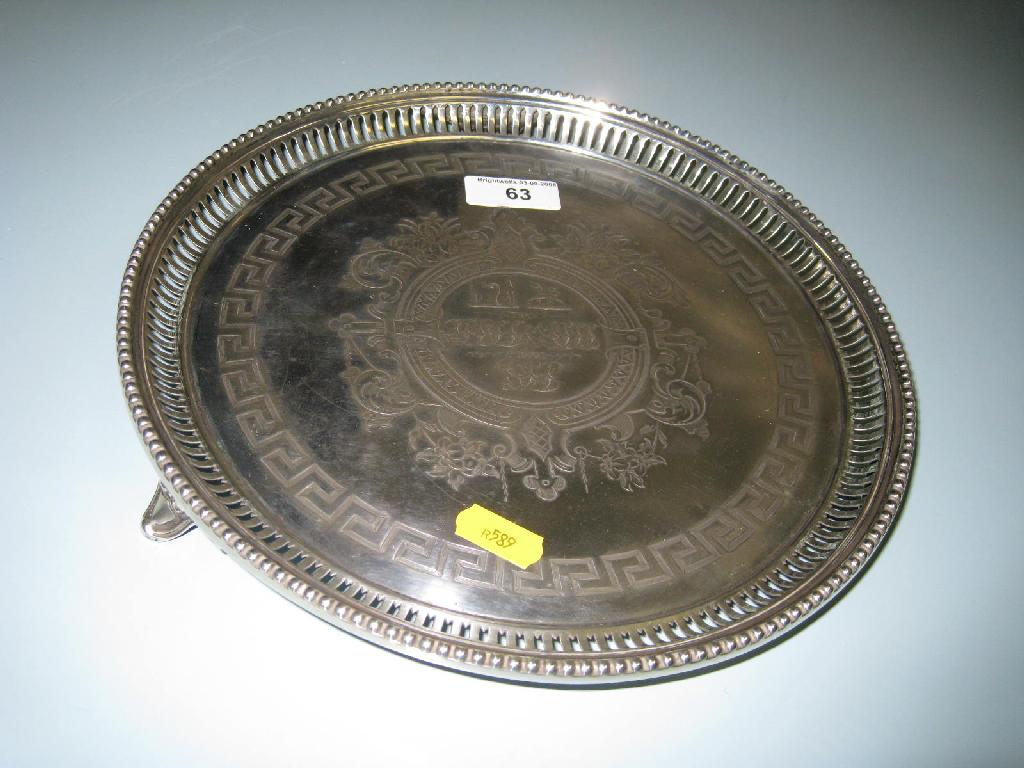 Appraisal: A Victorian circular Salver with engraved Greek key frieze and