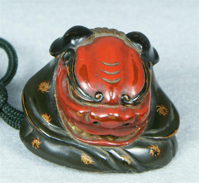 Appraisal: Great Japanese carved and lacquered wood foo lion head Netsuke