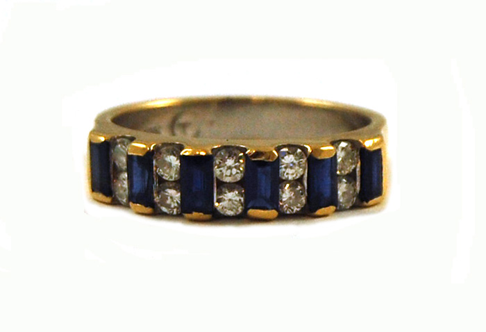 Appraisal: SAPPHIRE DIAMOND AND EIGHTEEN KARAT GOLD RING set with six